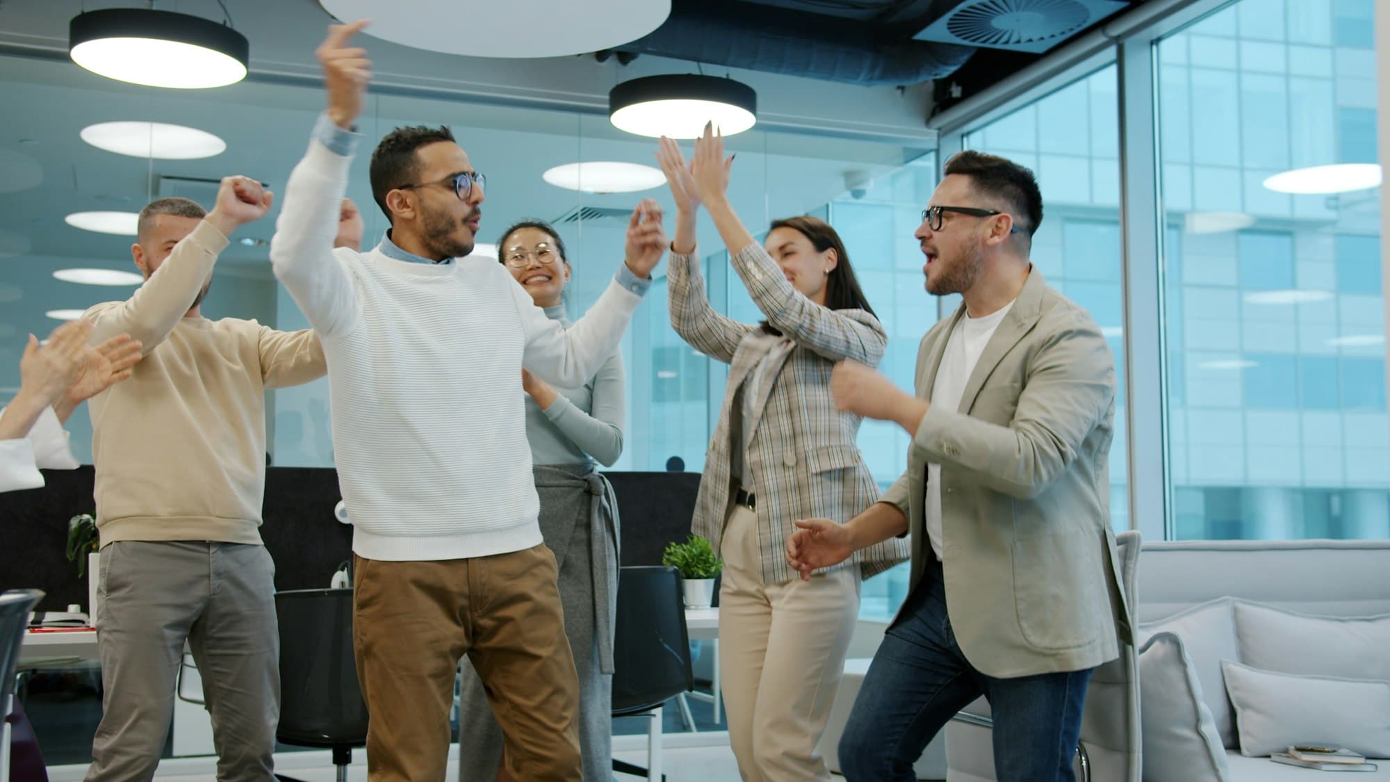 The Pinnacle AI team celebrating a shipped milestone together